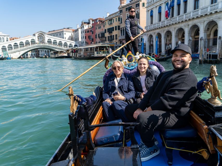 Venice: St. Mark's, Doges Palace, Rialto, and Gondola Tour - Doge’s Palace: gothic drama, Golden Staircase, and darker rooms